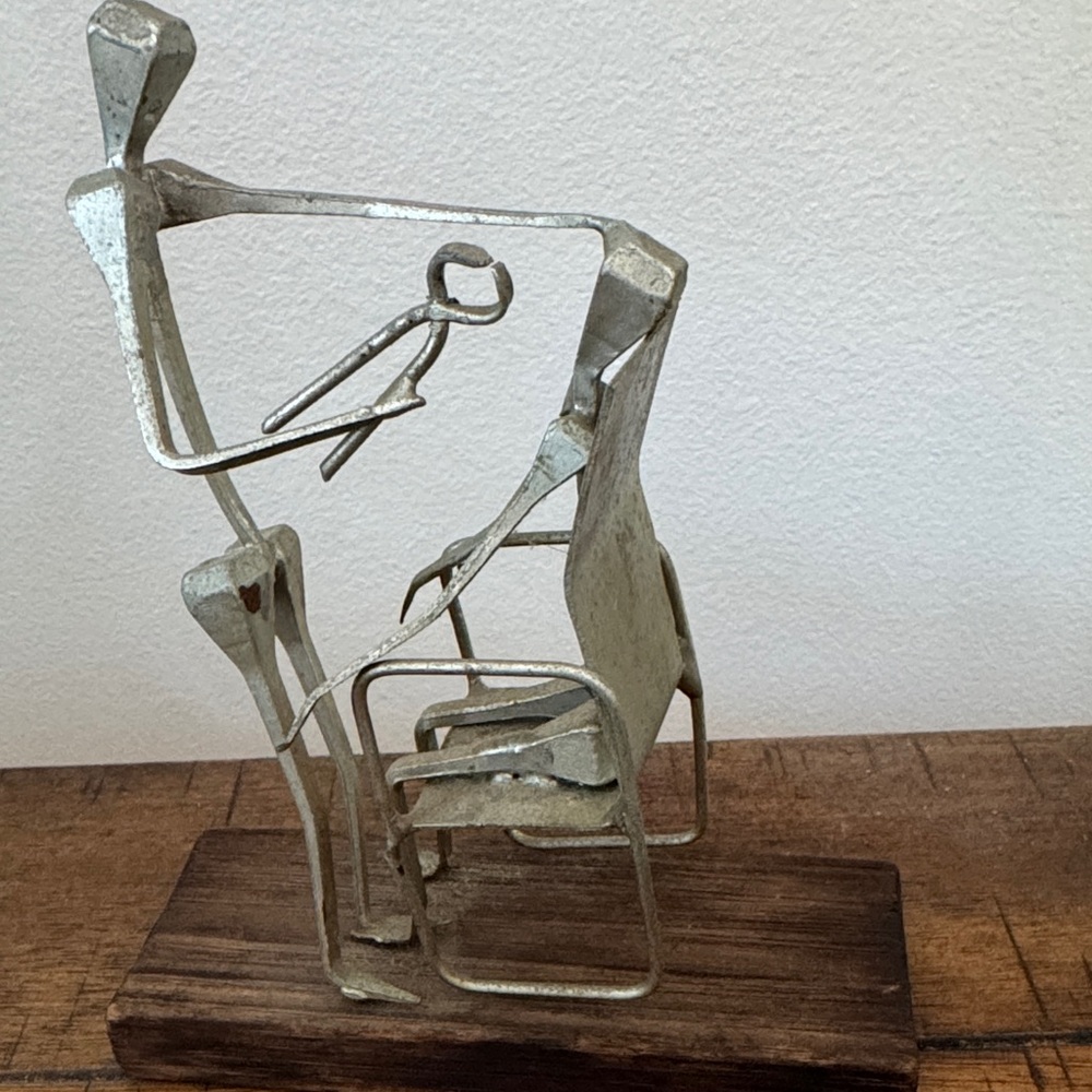 Abstract Silver Sculpture on Wooden Base